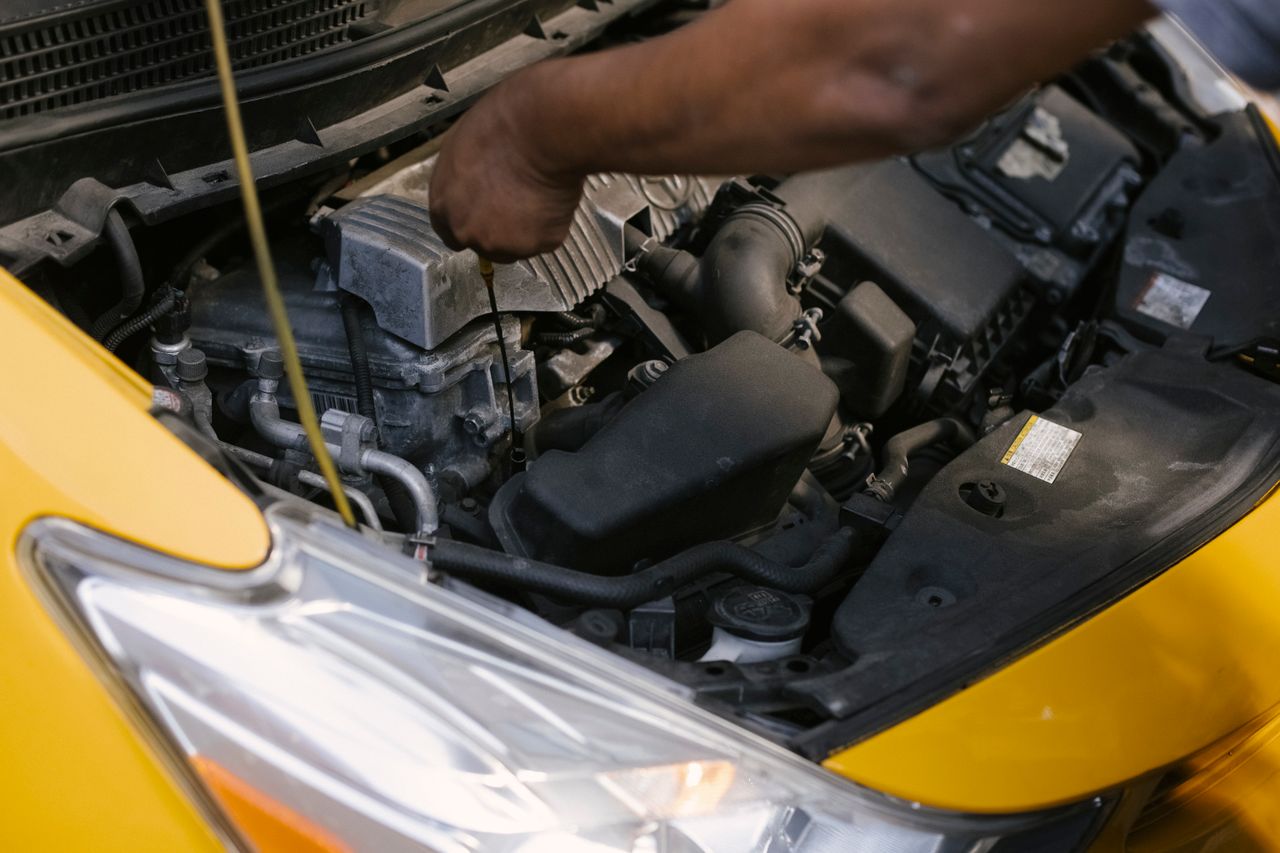 Mechanics working on a vehicle in the Ridgemotorworks workshop